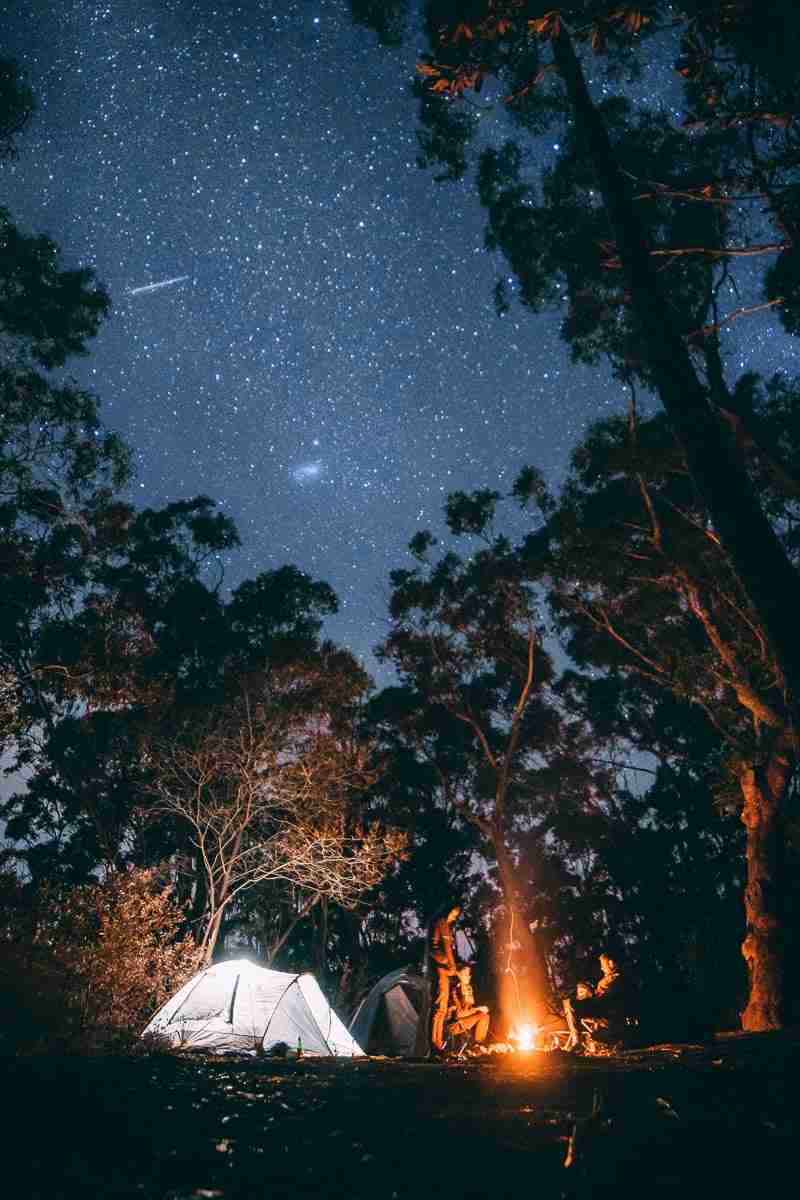 Fire and campsite at night